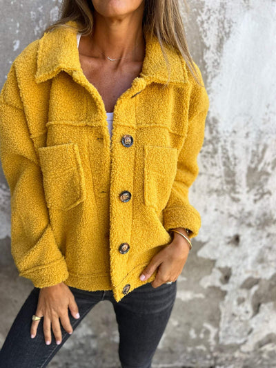 Manteau en laine d'agneau à simple boutonnage et revers