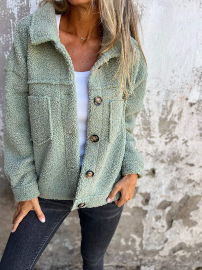 Manteau en laine d'agneau à simple boutonnage et revers