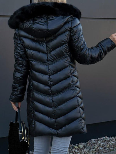 Manteau long en duvet avec capuche en fourrure