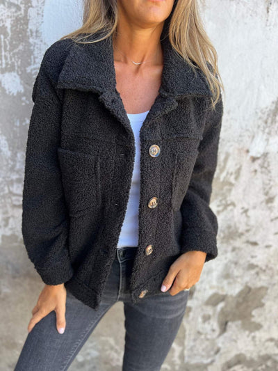 Manteau en laine d'agneau à simple boutonnage et revers