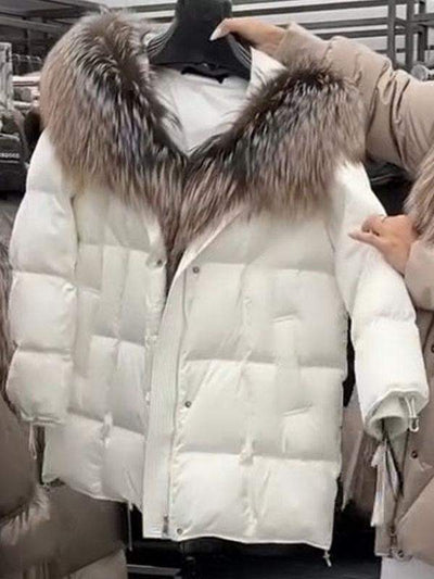 Veste en duvet mi-longue avec capuche en fourrure
