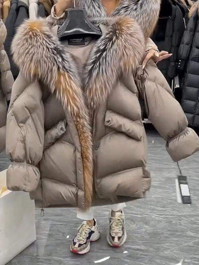 Veste en duvet mi-longue avec capuche en fourrure